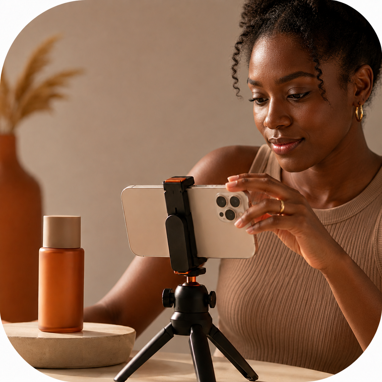 Creator filming a product with a phone on a tripod
